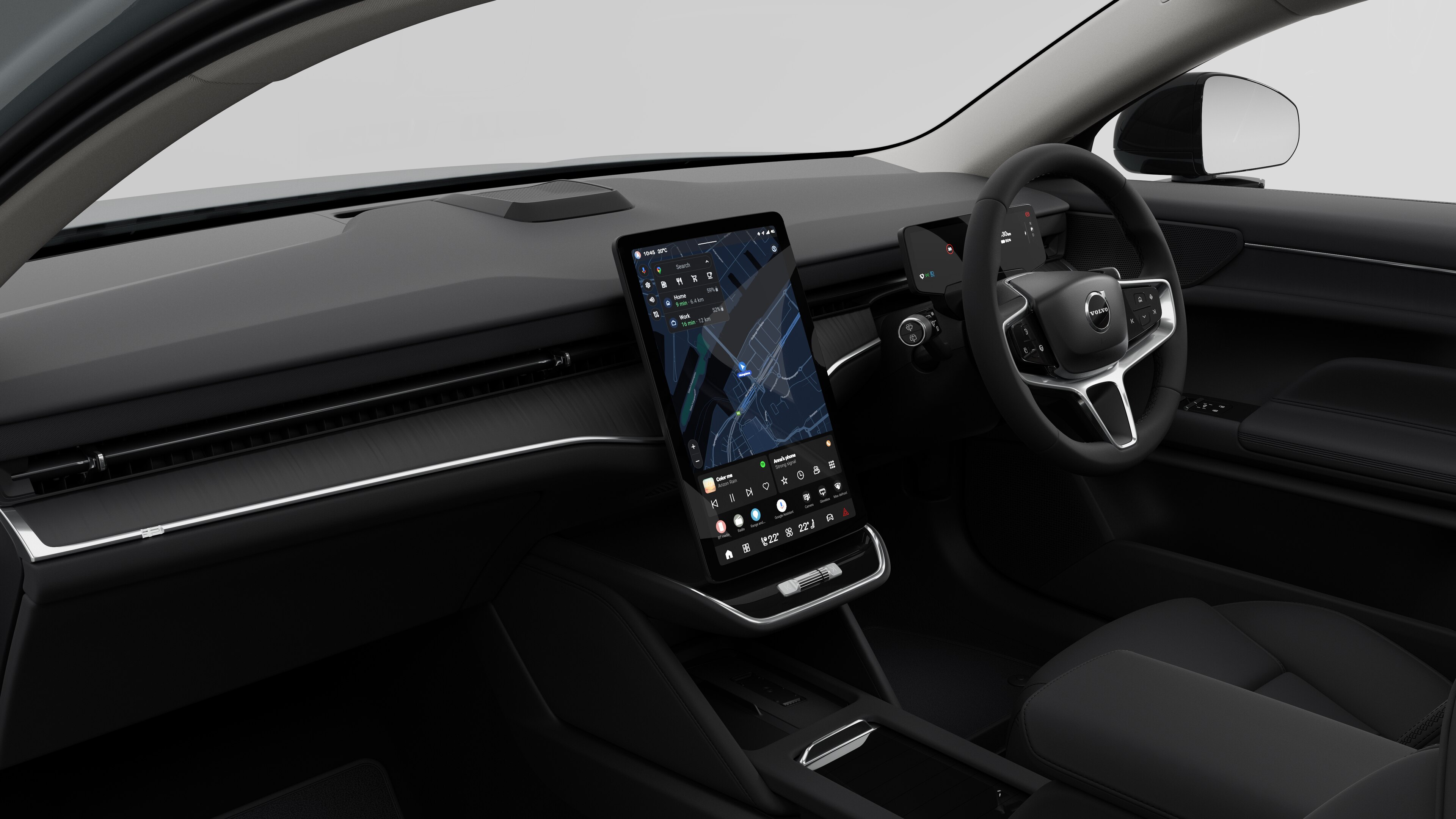 Interior view of a Volvo car showing the dashboard, steering wheel, center console, and digital display screen in a plain studio background.