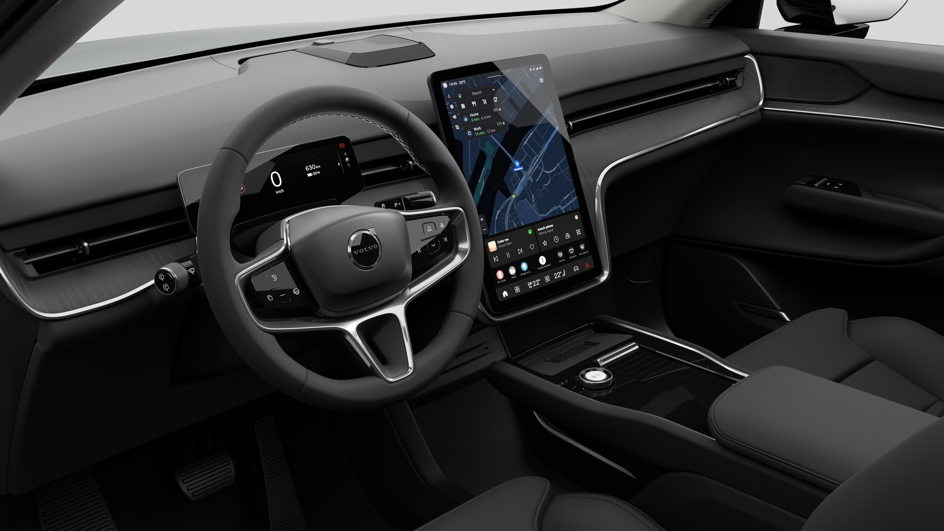 Binnenaanzicht van een Volvo met het dashboard, stuur, middenconsole en digitale display op een effen studioachtergrond.