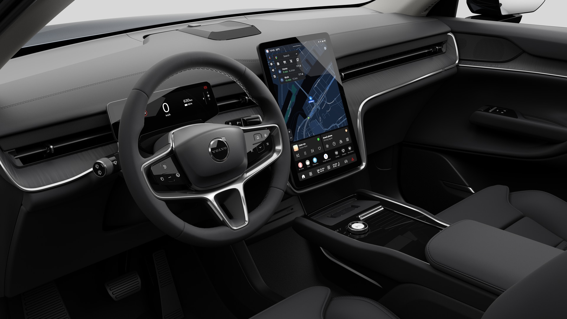 Vista interna di un'auto Volvo che mostra il cruscotto, il volante, la console centrale e lo schermo digitale sullo sfondo di uno studio.