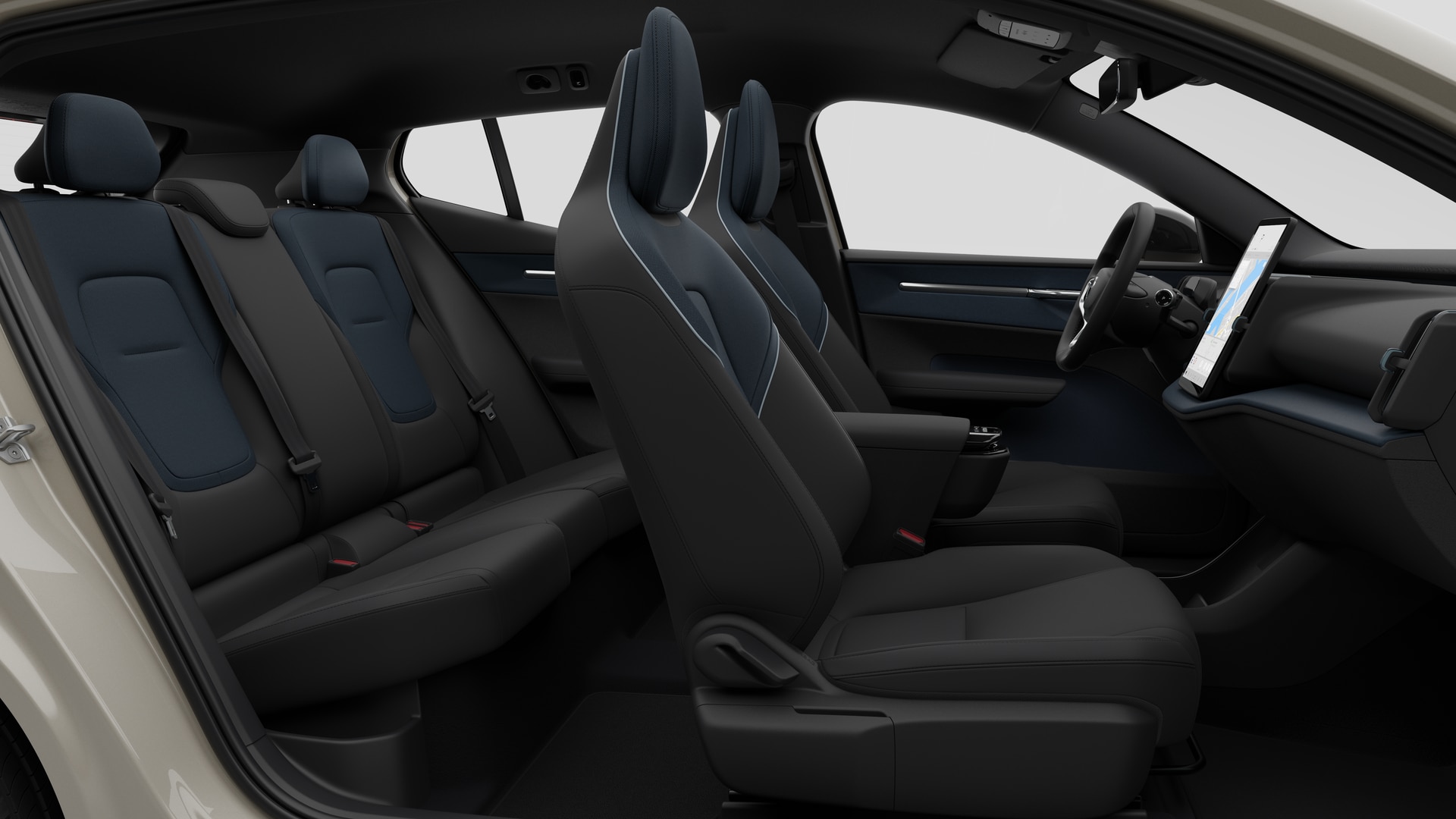 Vue latérale de l’intérieur d’une Volvo montrant les sièges avant, les sièges passager arrière, le volant, le tableau de bord et la console centrale, sur fond de studio.