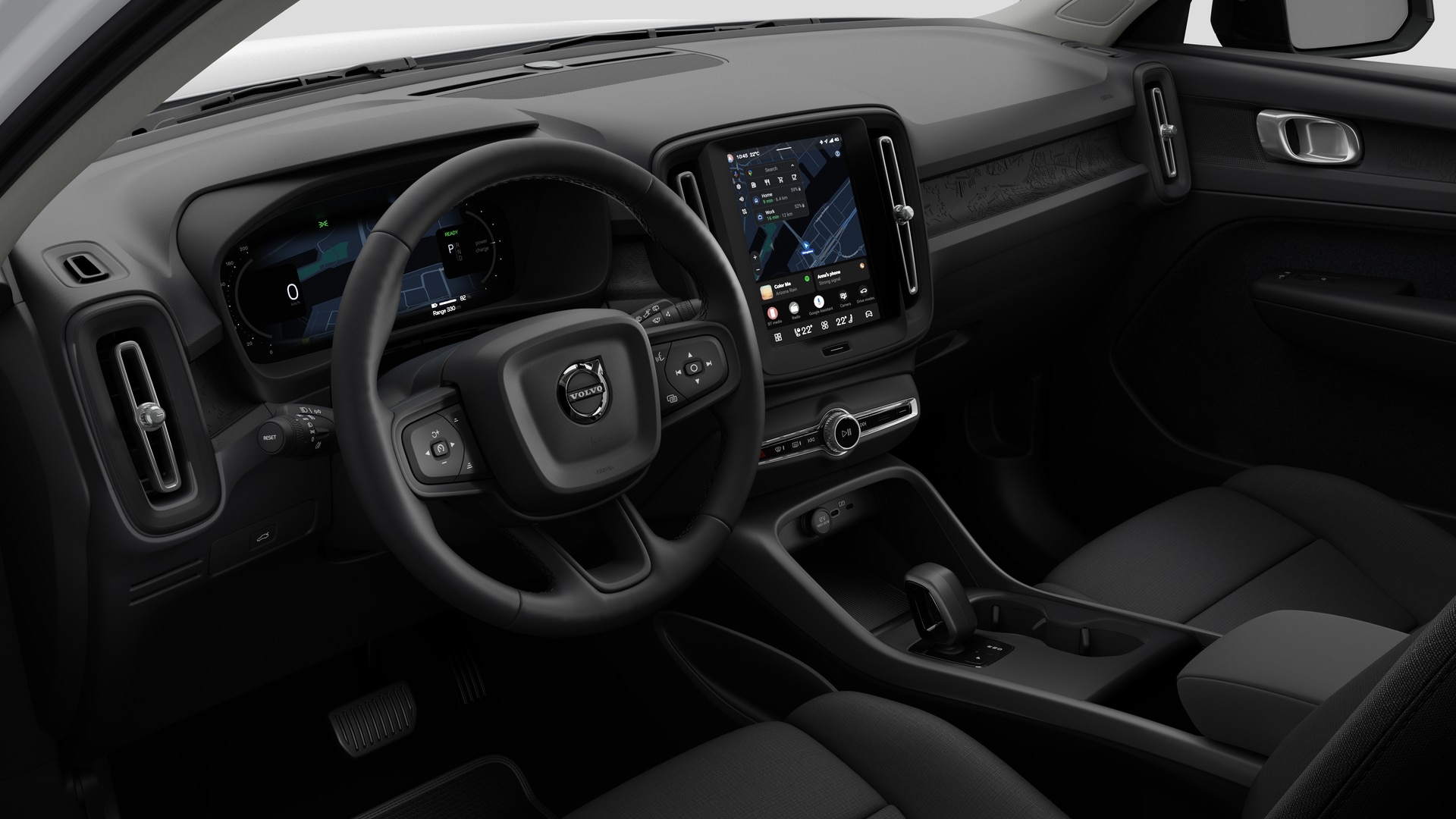 Wnętrze samochodu Volvo z deską rozdzielczą, kierownicą, konsolą środkową i cyfrowym wyświetlaczem na prostym tle studia