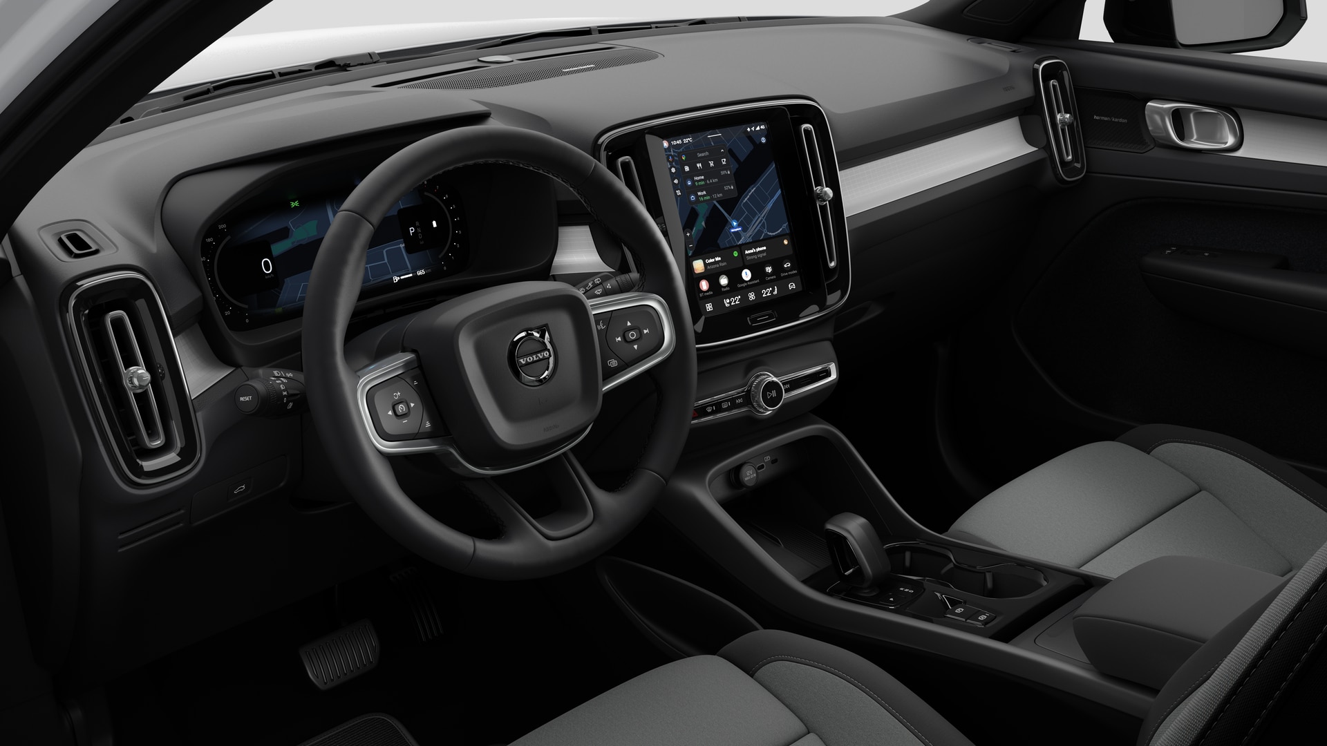 Wnętrze samochodu Volvo z deską rozdzielczą, kierownicą, konsolą środkową i cyfrowym wyświetlaczem na prostym tle studia