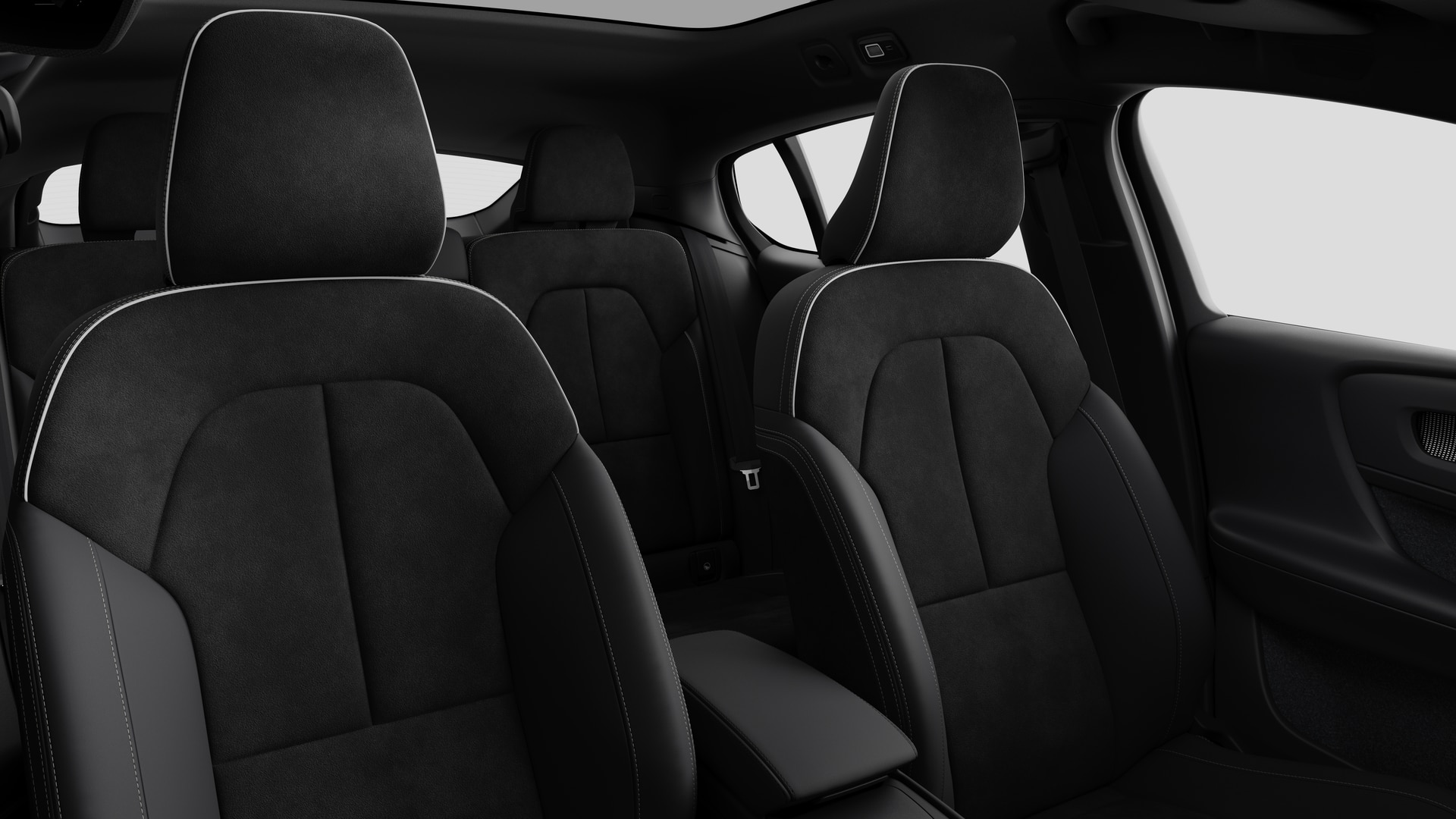 Volvo car interior showing rear passenger seats and centre console in plain studio background.
